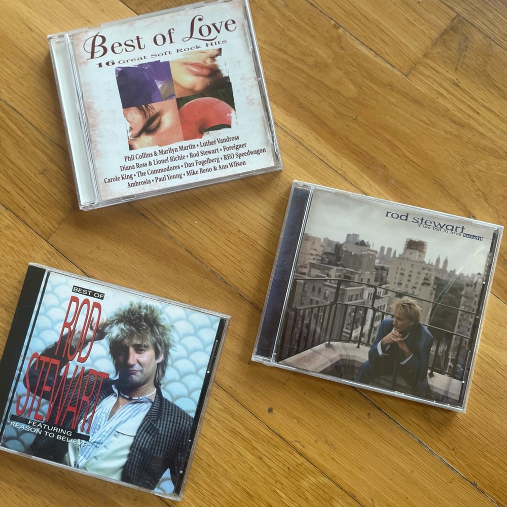 CD Collection — Best-Of Albums in Beige/White and Blue Covers